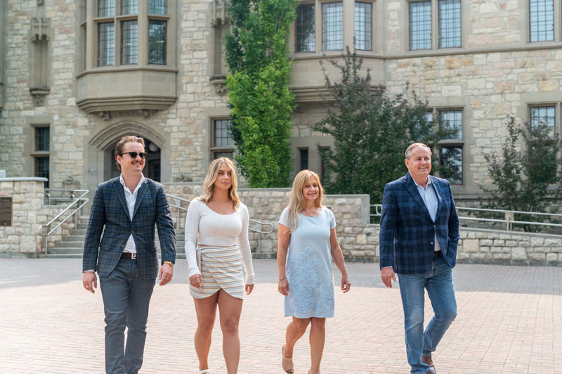 Photo of the Gitzel family walking on the USask campus